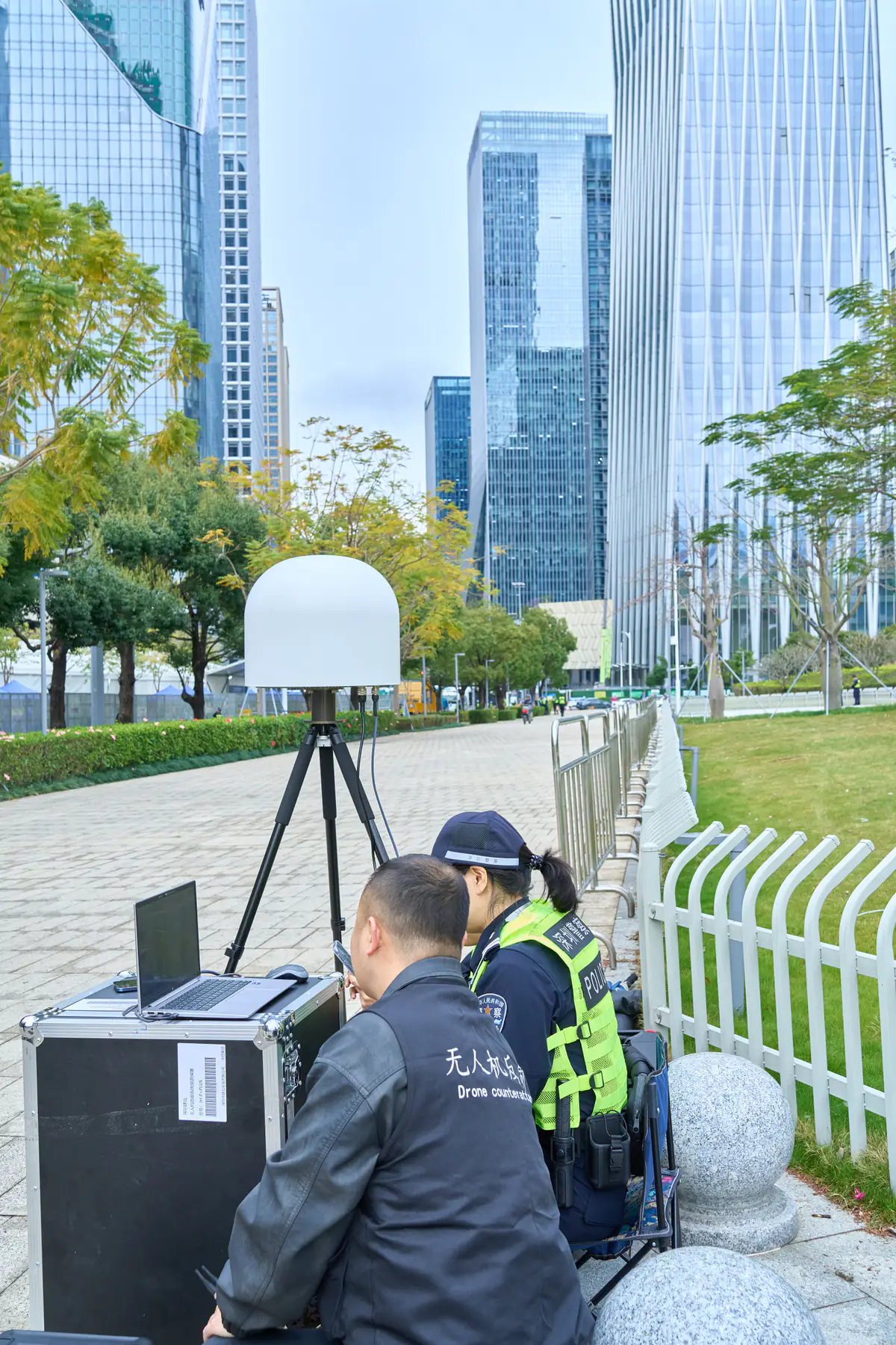 JianHong technician checking a deployed counter-drone sensor