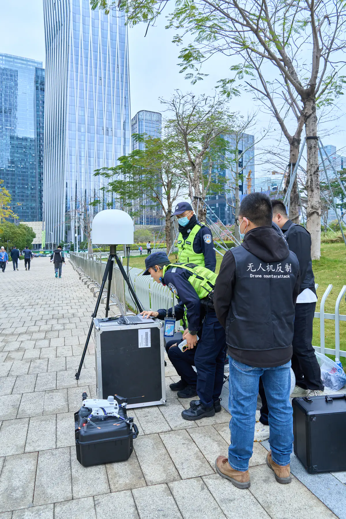 JianHong technician and field personnel commissioning a counter-drone sensor